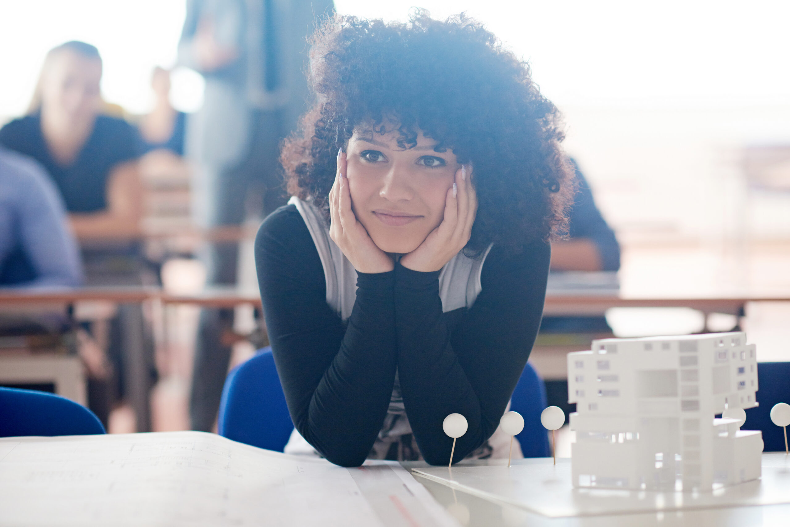 portrait of young female student at school classroom